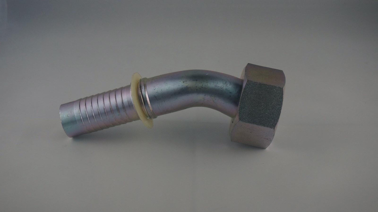 Raccord à sertir femelle coudé